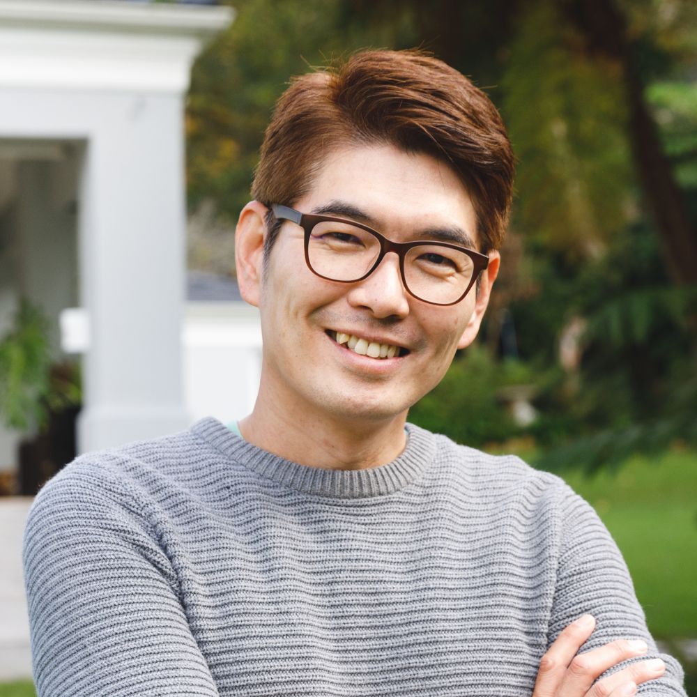 Portrait Of Happy Asian Man Wearing Glasses Smilin RTWNW4M 1